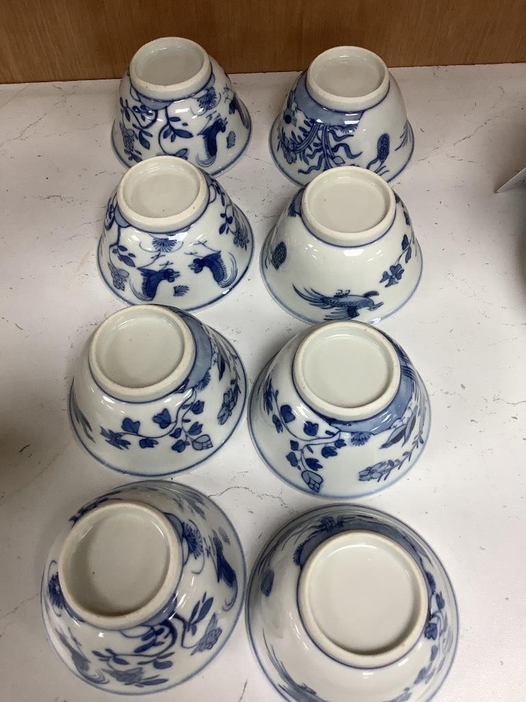 Five Chinese blue and white 'birds' tea bowls and four saucers and three 'chicken' tea bowls and four saucers (16)